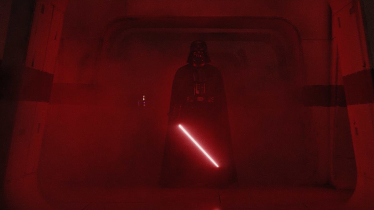 Darth Vader behind mist with his lightsaber